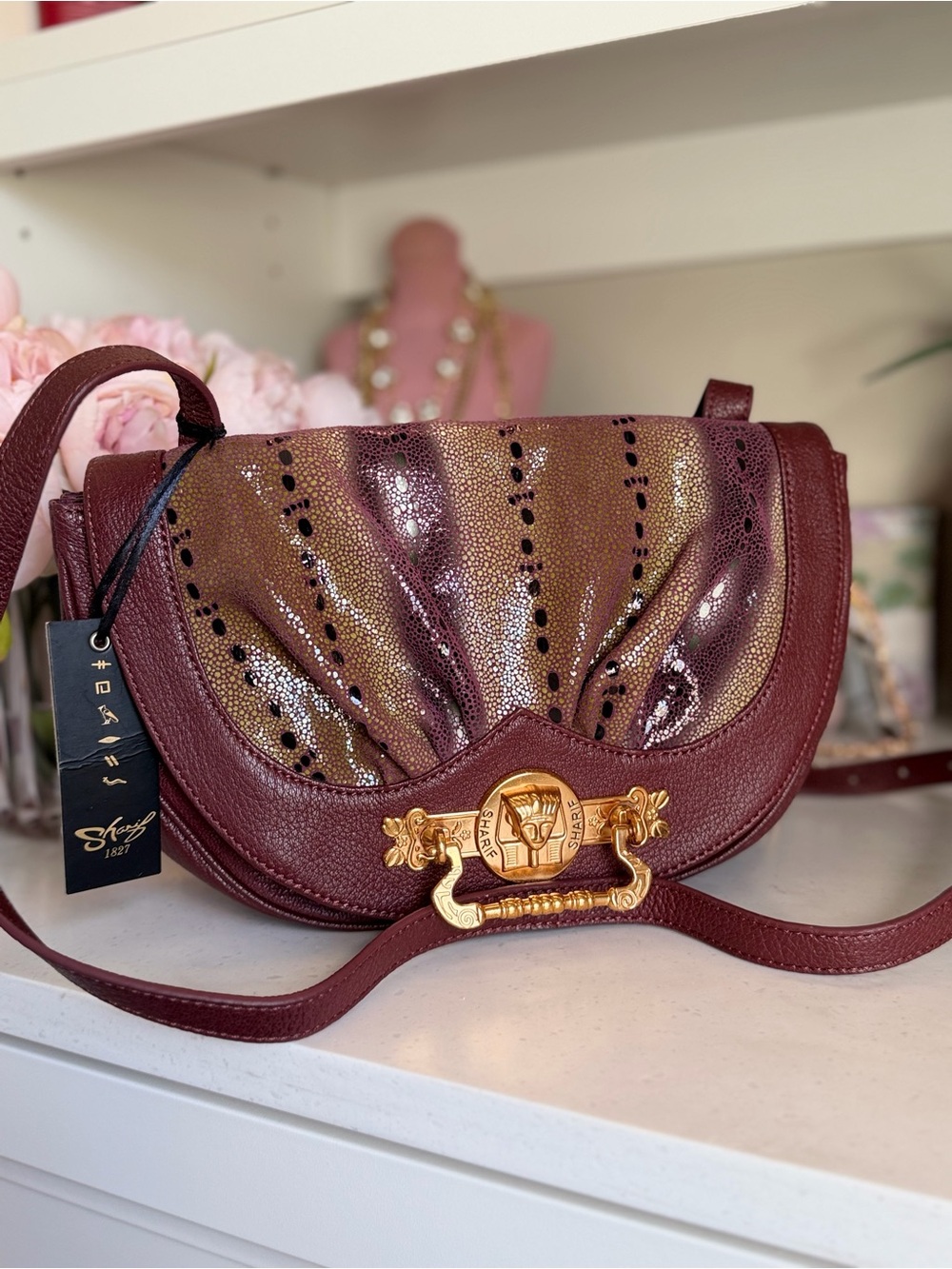 Sharif Burgundy Crossbody with Gold-Tone pharaoh medallion Clasp